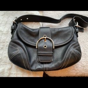 Coach black leather.